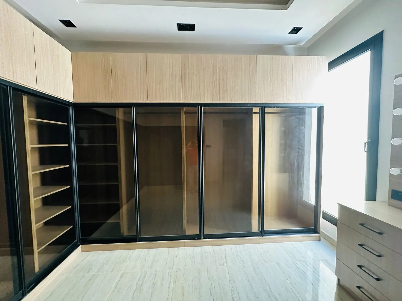 Glass-front Wardrobe completed by Hassan Pro Carpenter